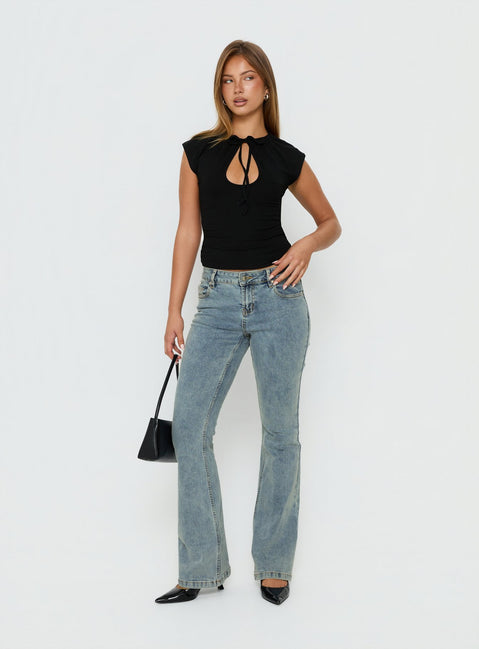 Showcasing Bethany Low Rise Bootleg Jeans Ice Wash in womens-jeans front view of model wearing Princess Polly