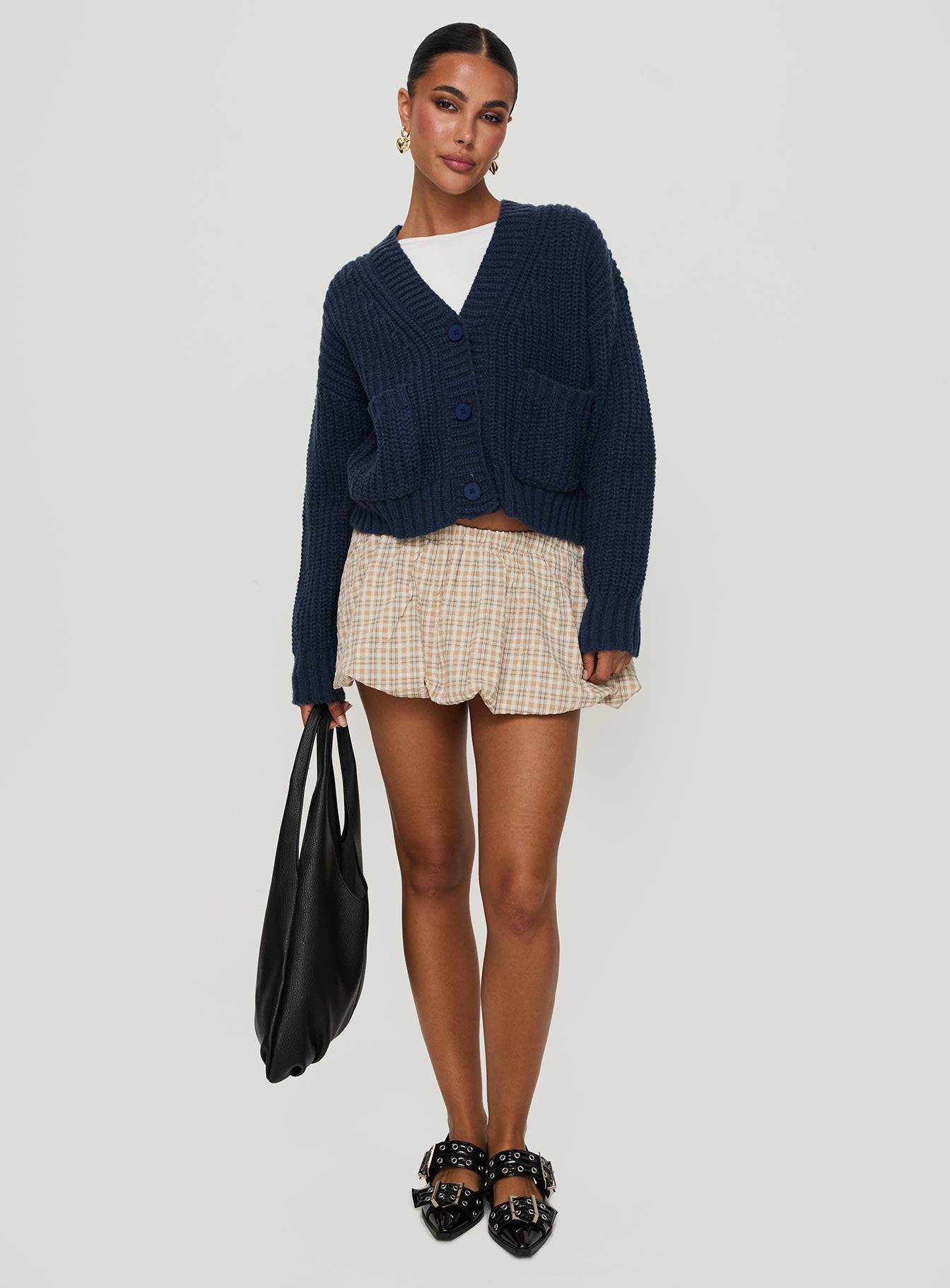 back view of model wearing Princess Polly Osias Cable Knit Cardigan Navy Cropped Jumpers 