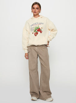 front view of model wearing Princess Polly Sweet Life Graphic Sweater Cream Long 