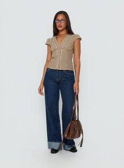 front view of model wearing Princess Polly Darla Low Rise Straight Leg Cuff Jean Dark Blue Wash Low Rise Jeans 