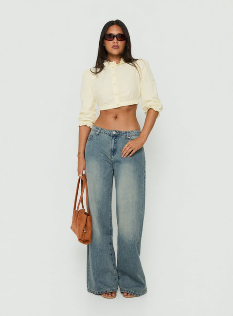 Showcasing Karlos Low Rise Cinched Baggy Jeans Vintage Mid Blue Wash womens-jeans with low-rise detail Princess Polly