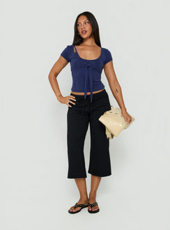 Designed with Kallora Low Rise Wide Leg Capris Black womens-regular-pants side view of model wearing Princess Polly