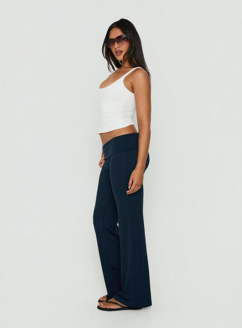 Designed with comfort Layover Straight Leg Pants Navy Stripe womens-regular-pants featuring mid-rise waist side view of model wearing Princess Polly