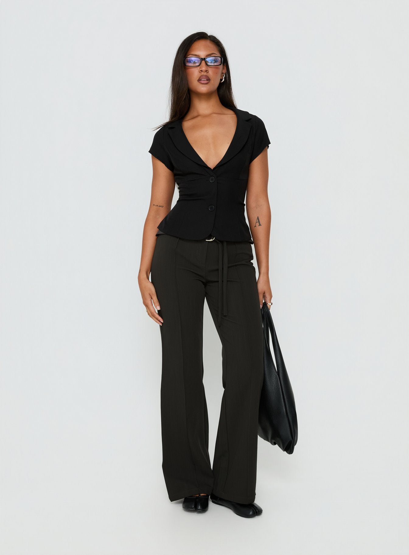 Discover the Belvia Layered Mid Rise Pants Slate Grey womens-regular-pants styled with belt and showcasing full-length wide-leg cut front view of model wearing Princess Polly