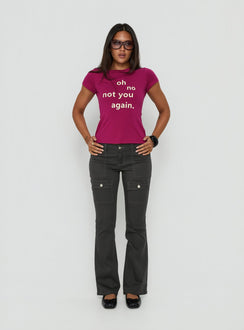 Crafted from charcoal fabric, the Trust Fund Low Rise Bootleg Cargo Pants in womens regular pants, front view of model wearing Princess Polly