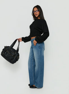 Presenting the Serenitia Mid Rise Foldover Relaxed Jeans Vintage Mid Blue in womens-jeans with belt side view of model wearing Princess Polly