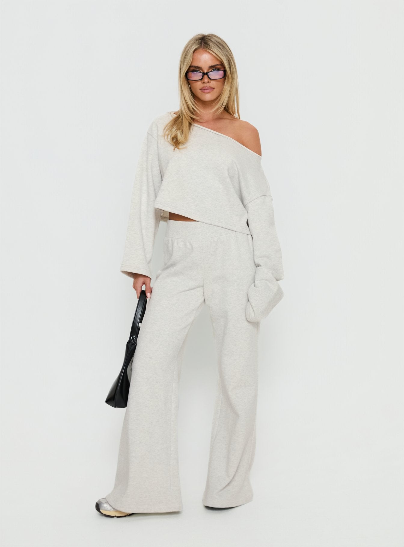 front view of model wearing Princess Polly Peaks Flared Track Pants Snow Marle Mid Rise Pants Pants 