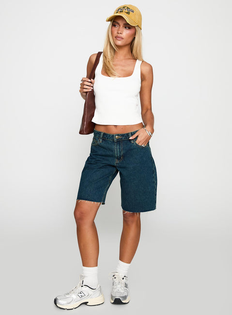 front view of model wearing Princess Polly Cult Classic Longline Denim Shorts Vintage Wash Low Rise Shorts 