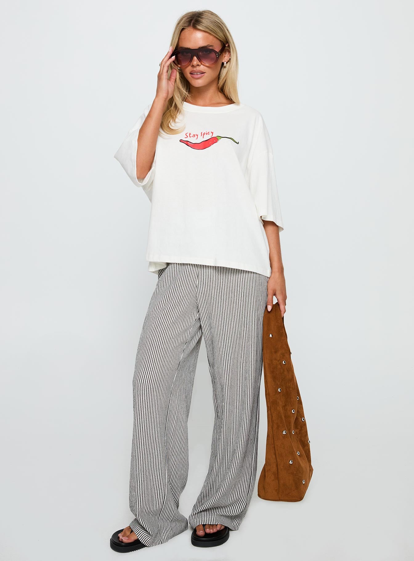 front view of model wearing Princess Polly Stay Spicy Graphic Top White Half Sleeves Crew Neck 