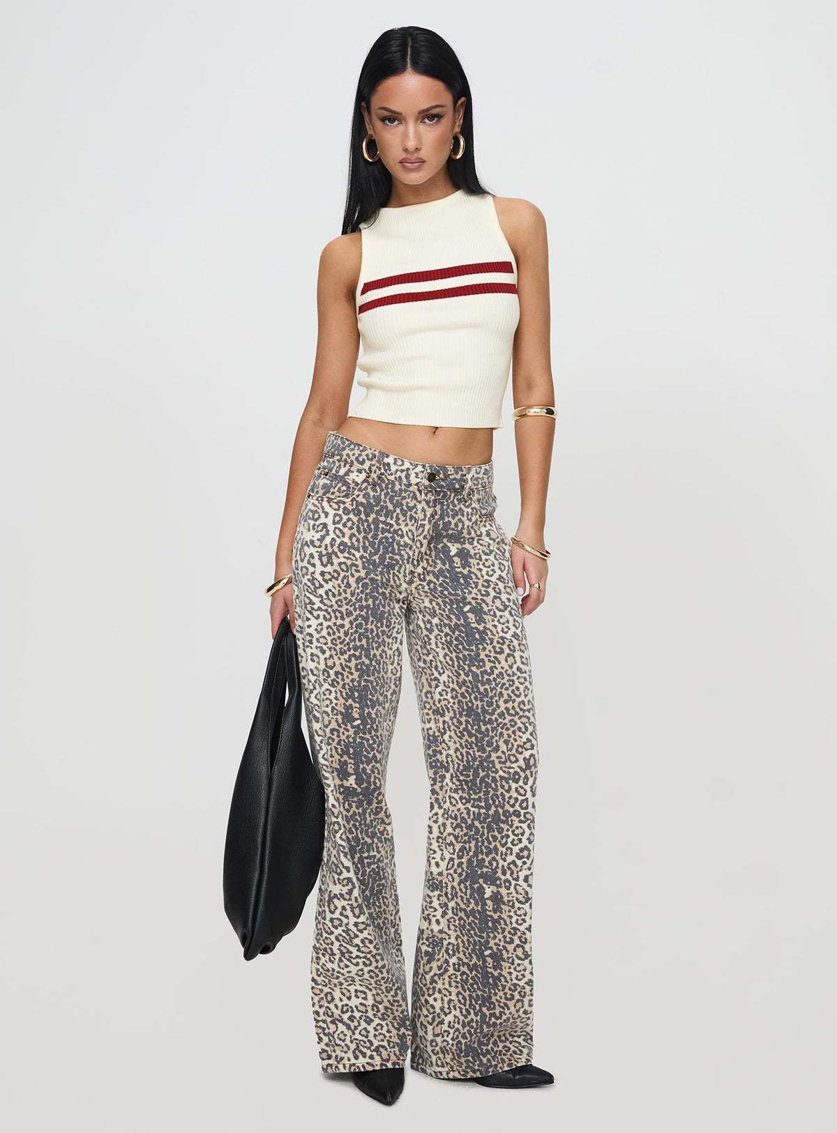 front view of model wearing Princess Polly Top Model Jeans Leopard Fade Mid Rise 