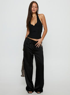 side view of model wearing Princess Polly Soulstar Satin Pants Black High Rise Pants 