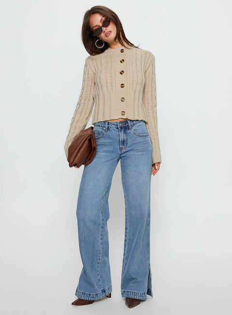 side view of model wearing Princess Polly Donielle Cable Knit Cardigan Beige cropped Jumpers 
