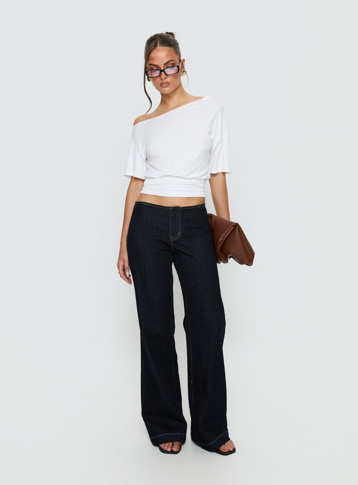 side view of model wearing Princess Polly Buenos No Waist Low Rise Straight Leg Jeans Raw Denim Mid Rise Jeans 