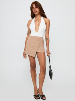   front view of model wearing Princess Polly Strangers Mini Skirt Beige Mini Skirts 