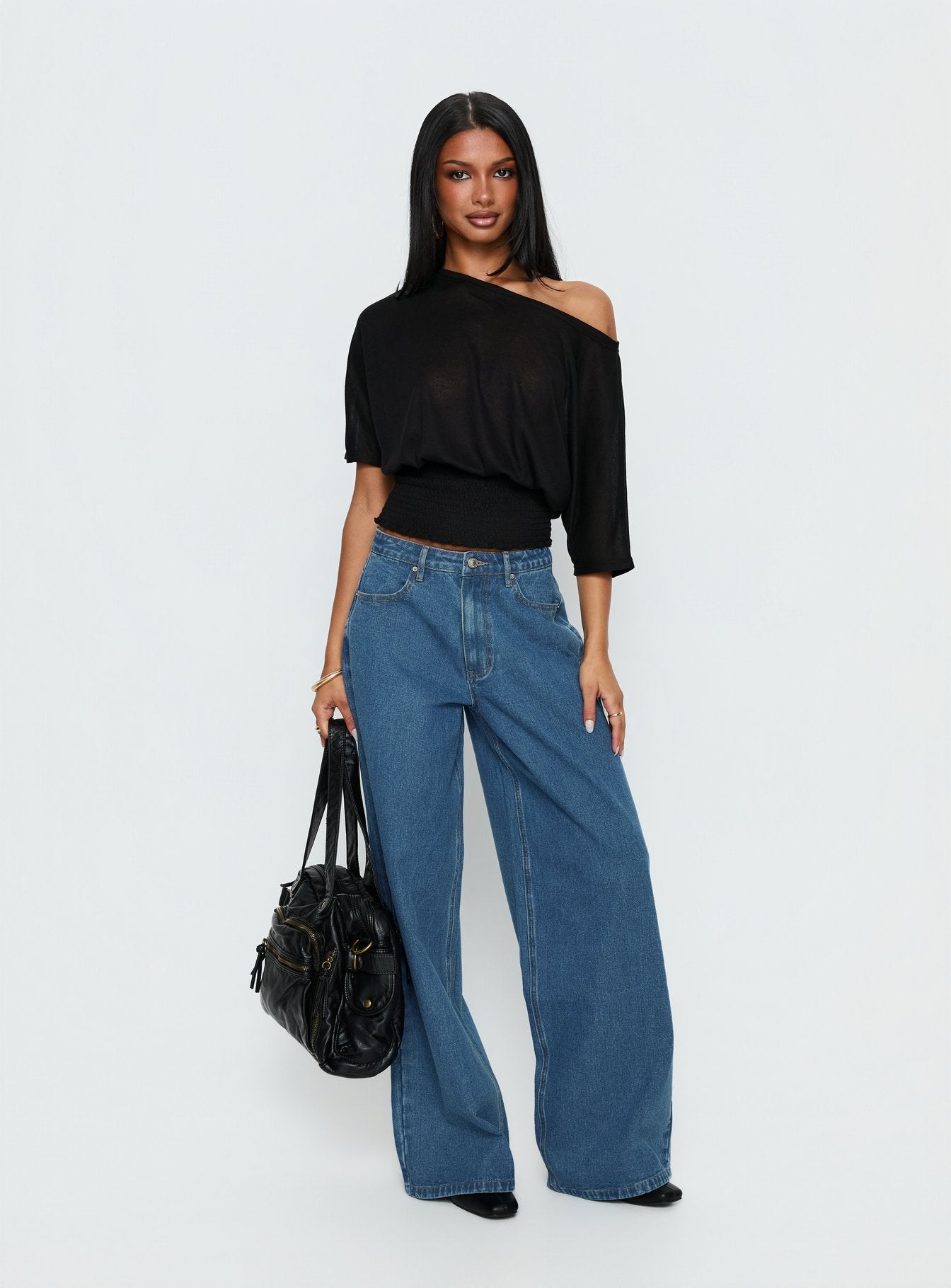 front view of model wearing Princess Polly Naylor Mid Rise Wide Leg Jeans Mid Blue Wash Mid Rise Jeans 