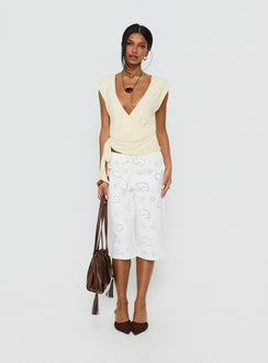 front view of model wearing Princess Polly Roda Anglaise Longline Shorts White Mid Rise Pants 