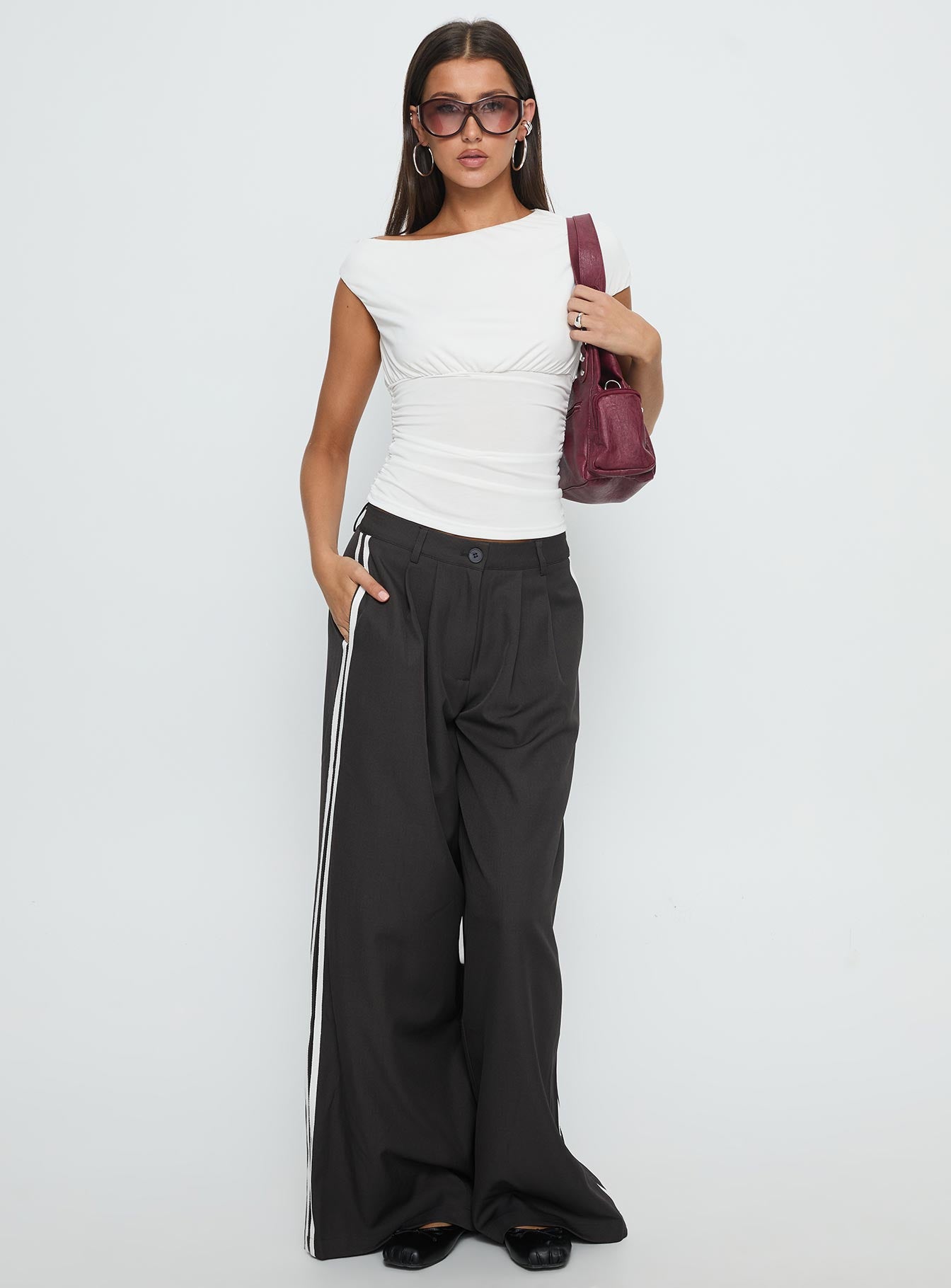 side view of model wearing Princess Polly Serenity Pant Ash Low Rise Pants 