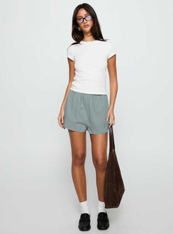 front view of model wearing Princess Polly Fealure Shorts Green High Waisted Shorts 