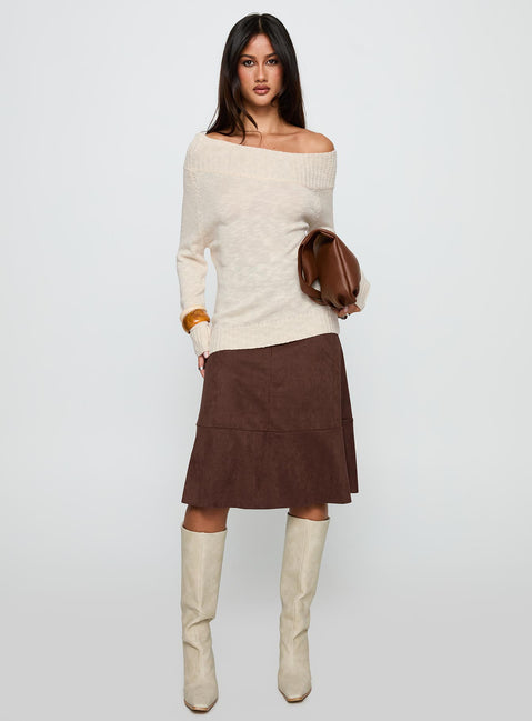Crafted with care, the Alyxandra Off Shoulder Knit Sweater in Beige is a long oversized womens jumper featuring a boat neckline, side view of model wearing Princess Polly