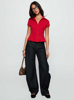 side view of model wearing Princess Polly Cottesloe Blouse Top Red Short Sleeves V-Neck 