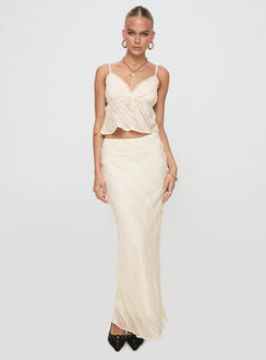   side view of model wearing Princess Polly Jacintha Maxi Skirt Cream Maxi Skirts Skirts 