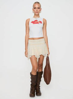   side view of model wearing Princess Polly Lifas Lace Mini Skirt Cream Mini Skirts 
