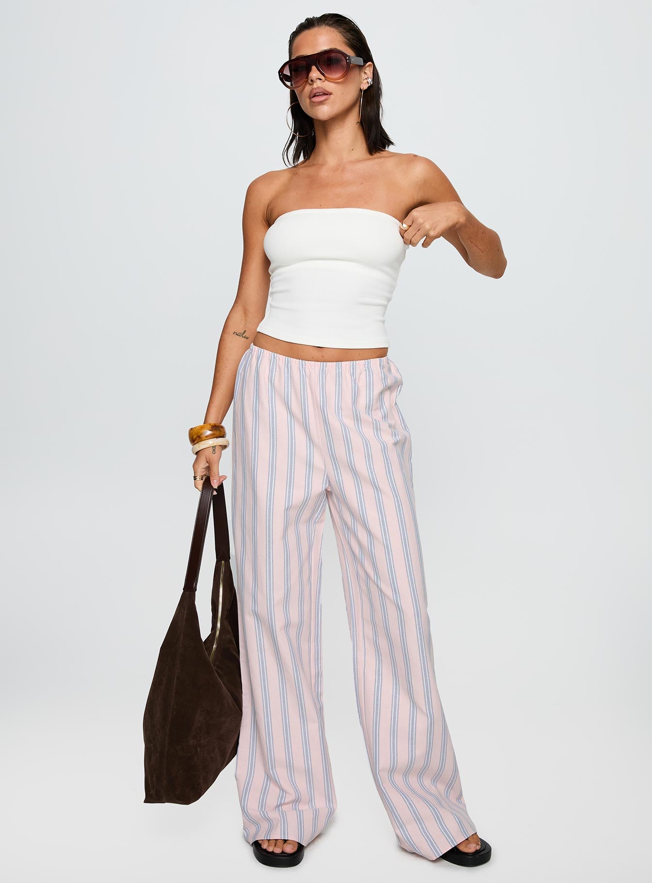 front view of model wearing Princess Polly Limestone Pants Pink Multi Low Rise Pants 