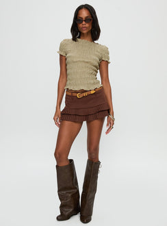 front view of model wearing Princess Polly Deei Double Ruffle Mini Skort Chocolate Low Rise Shorts 