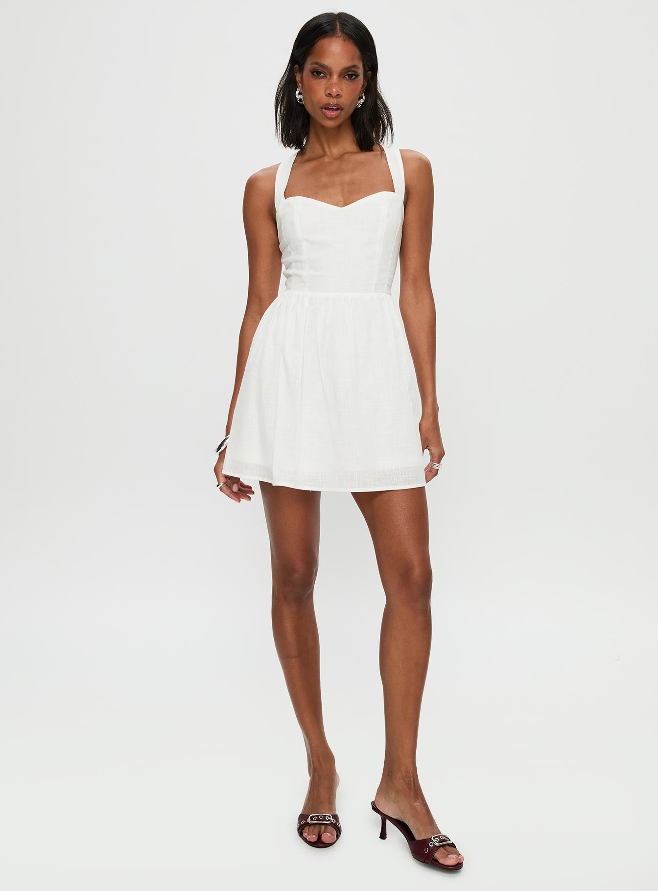 back view of model wearing Princess Polly Zolena Halter Mini Dress White Sweetheart Neckline 