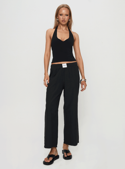 front view of model wearing Princess Polly Beach House Pants Black Low Rise Pants 