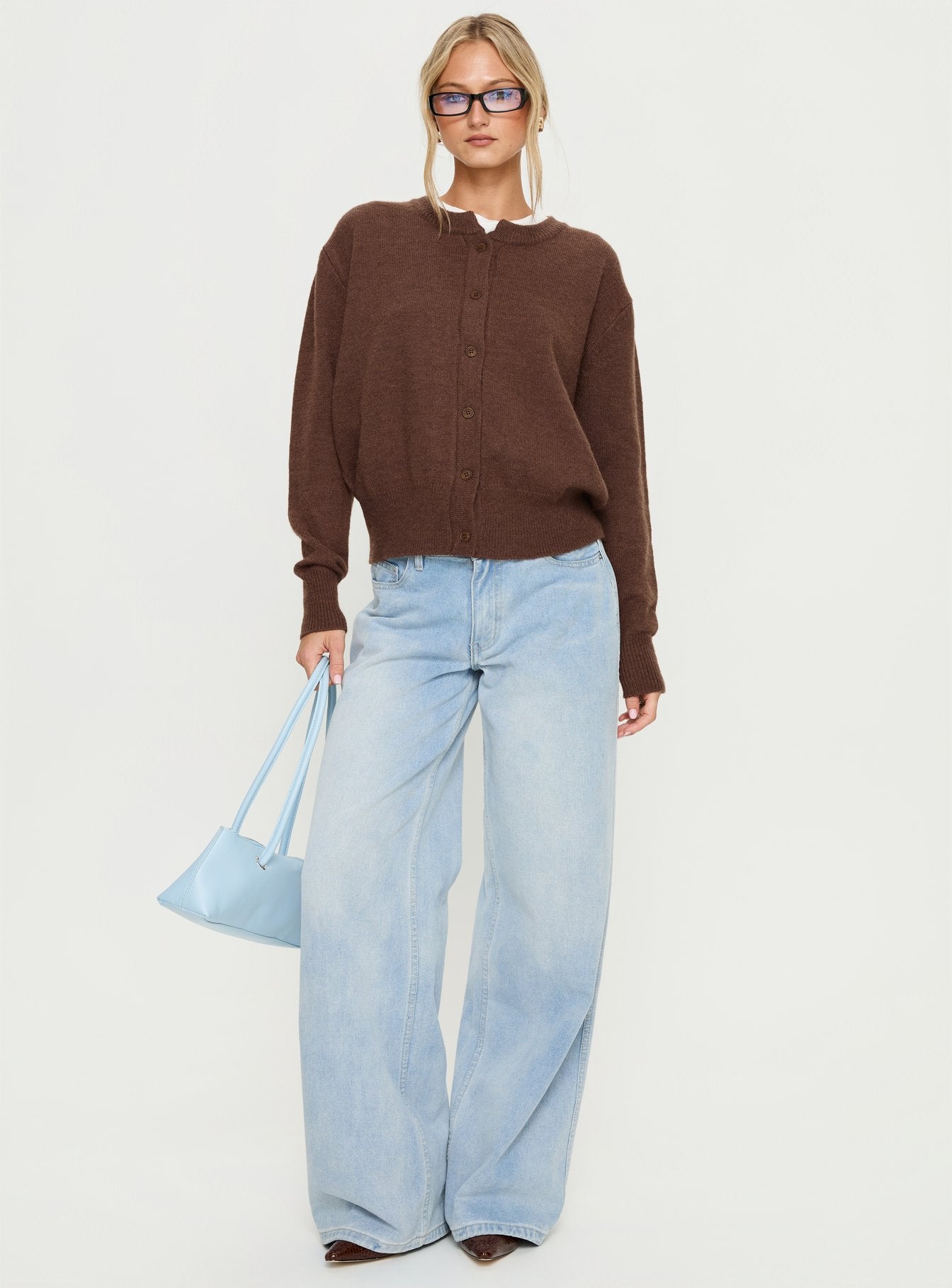 side view of model wearing Princess Polly Melancholia Cardigan Chocolate regular Jumpers 