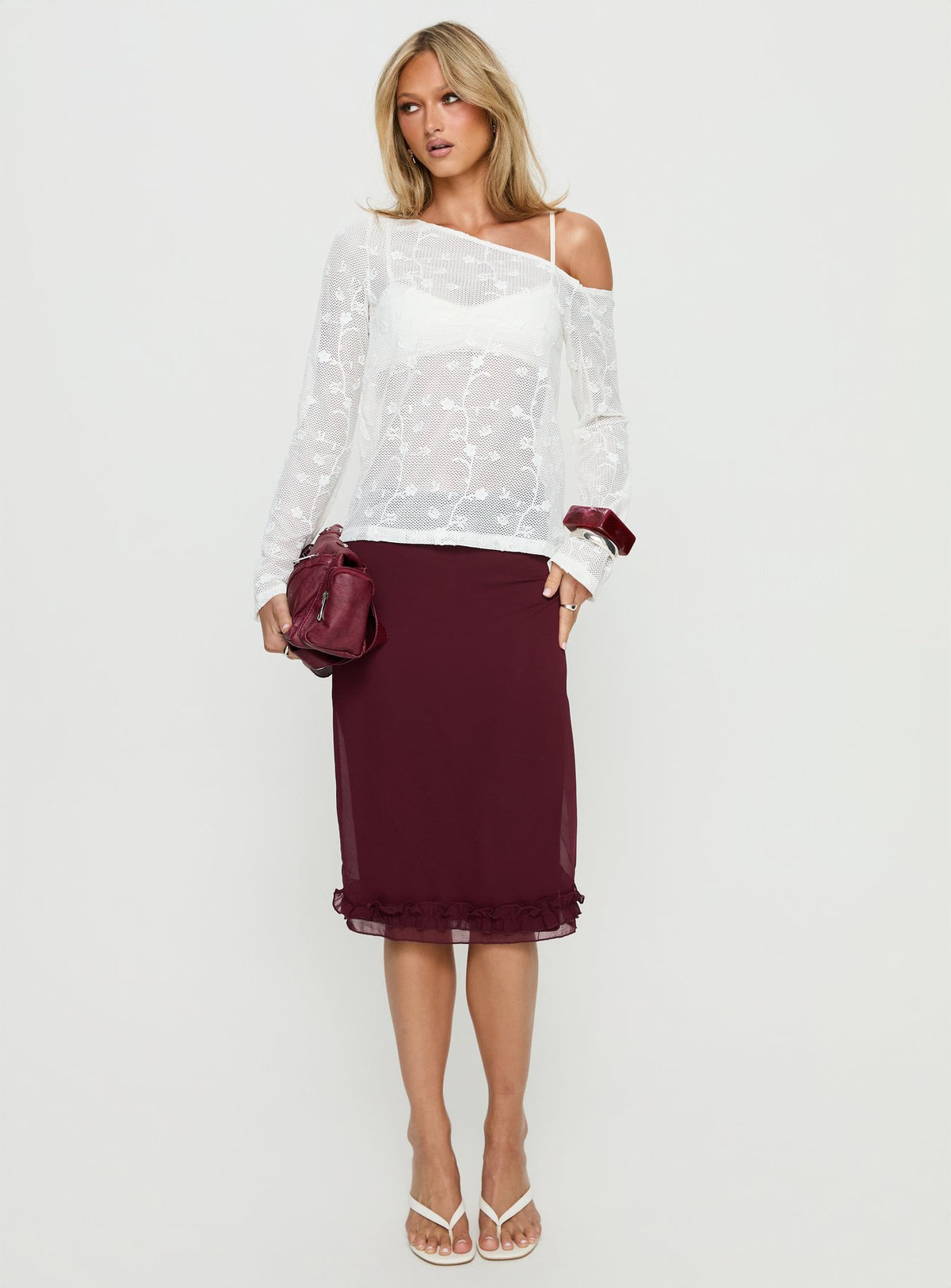   front view of model wearing Princess Polly Rosette Frill Midi Skirt Currant 