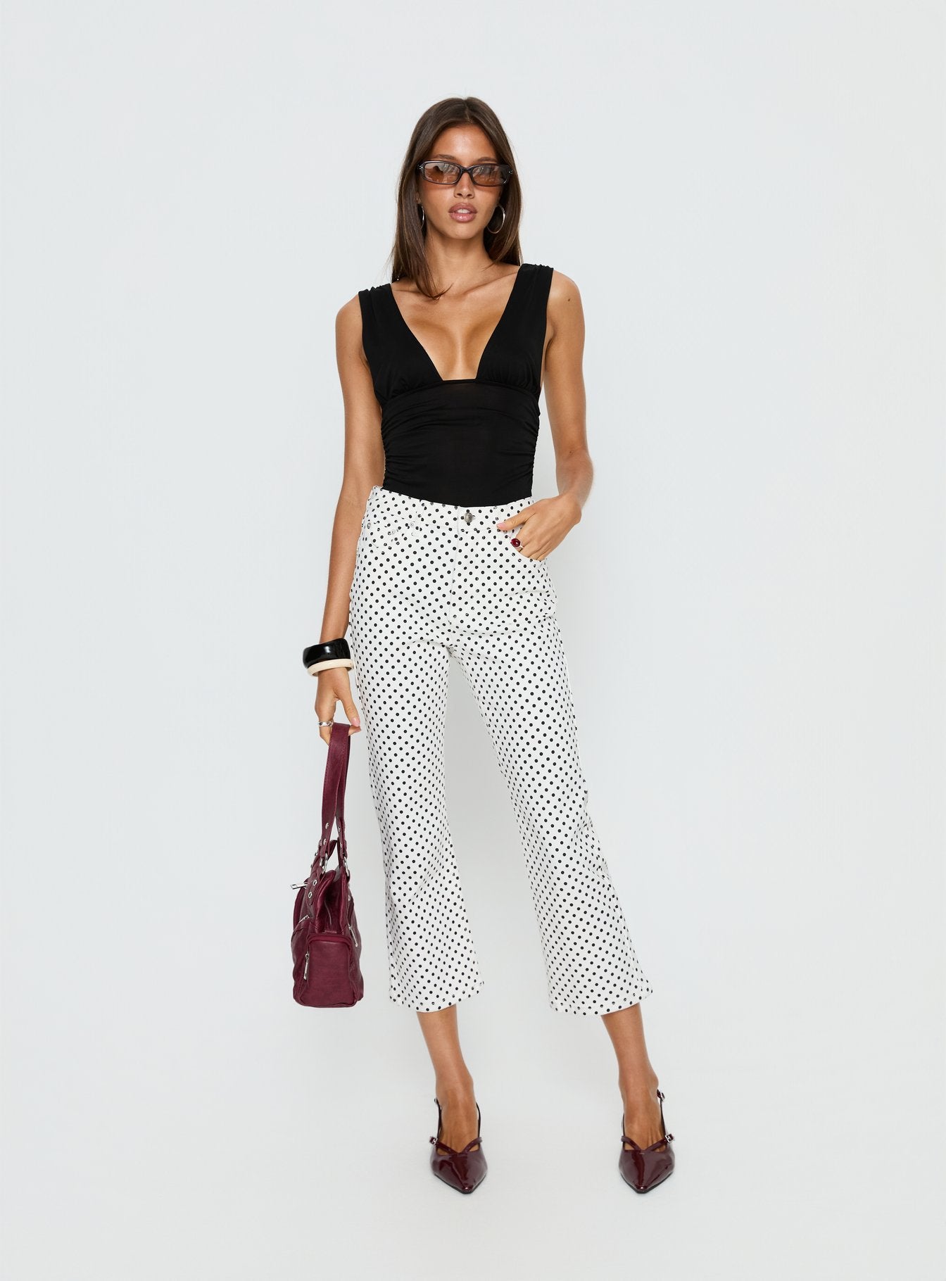 front view of model wearing Princess Polly Cindee High Rise Cropped Jeans White Polka Dot High Rise Jeans 