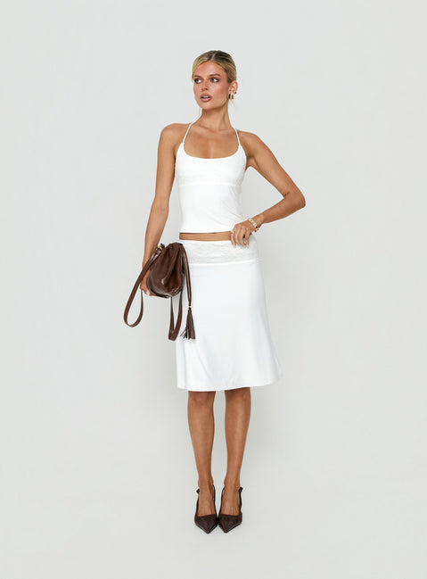 Showcasing the Zenaide Lace Detail Midi Skirt White womens-skirts with midi length front view of model wearing Princess Polly