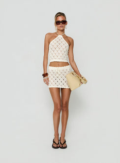 Discover the Harrietah Crochet Tie Waist Mini Skirt in white, a women's fitted aline skirt featuring mini length front view of model wearing Princess Polly