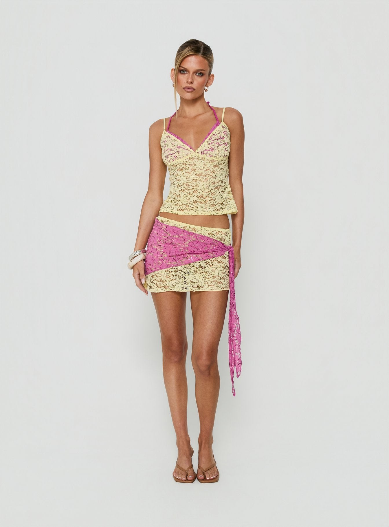 Featuring the Sirna Lace Wrap Contrast Mini Skirt Lime / Pink womens-skirts mini product Princess Polly