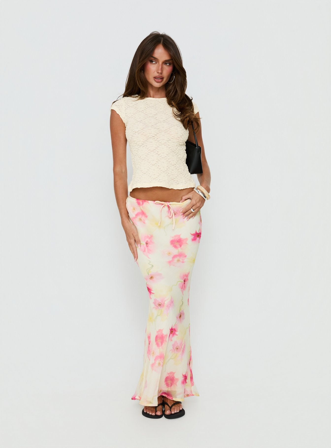   front view of model wearing Princess Polly Mercer Maxi Skirt Yellow Floral Maxi Skirts Skirts 