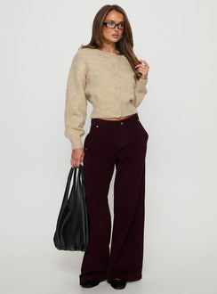 side view of model wearing Princess Polly Jacynda Low Waist Wide Leg Corduroy Jeans Currant Mid Rise Jeans 