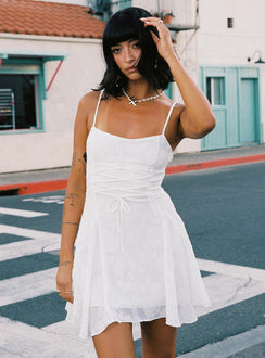 side view of model wearing Princess Polly Wispie Lace Up Mini Dress White Square Neck 