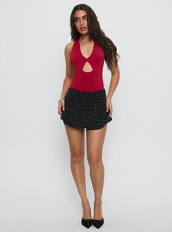 front view of model wearing Princess Polly Sugarberry Cut Out Bodysuit Red Sleeveless Bodysuit 