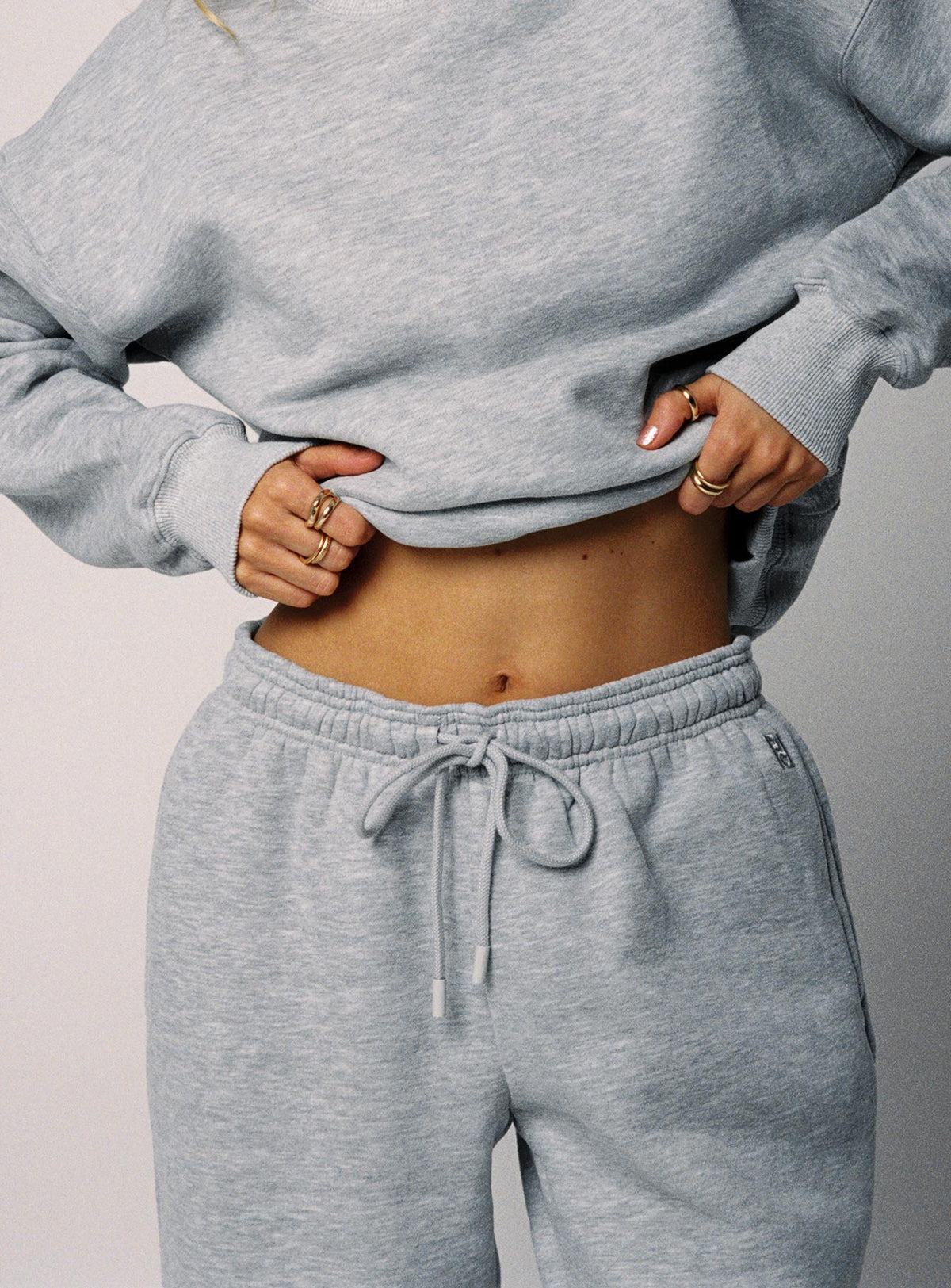 front view of model wearing Princess Polly Dream Fleece Ankle Cuff Sweatpants Grey Marle High Waisted Pants 