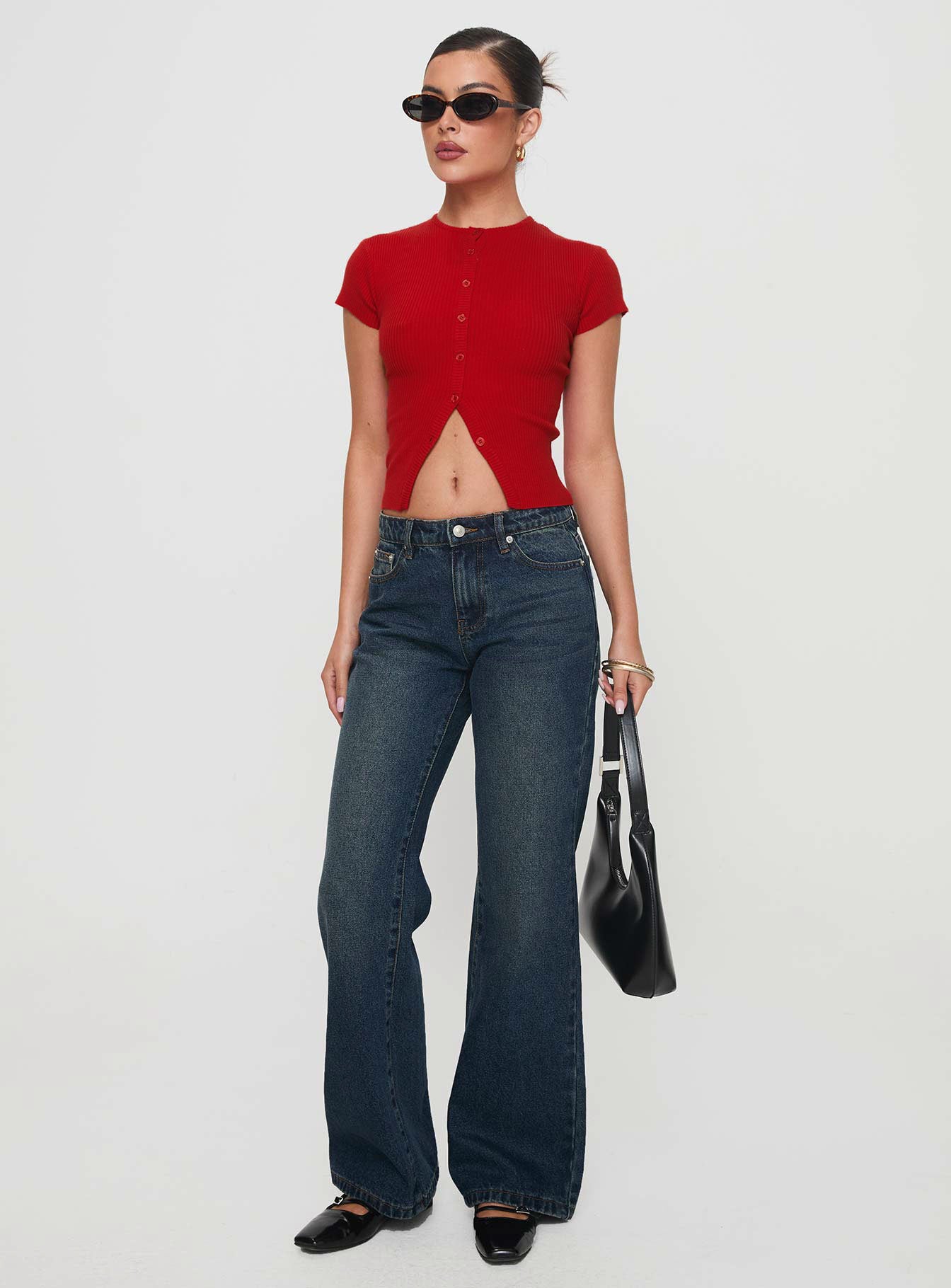 front view of model wearing Princess Polly Suzu Top Red Short Sleeves High Neck 