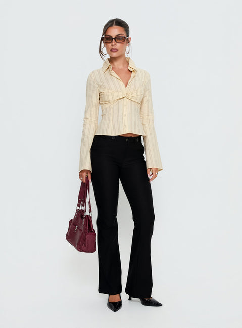 front view of model wearing Princess Polly Dariana Flare Pants Black Mid Rise Pants 