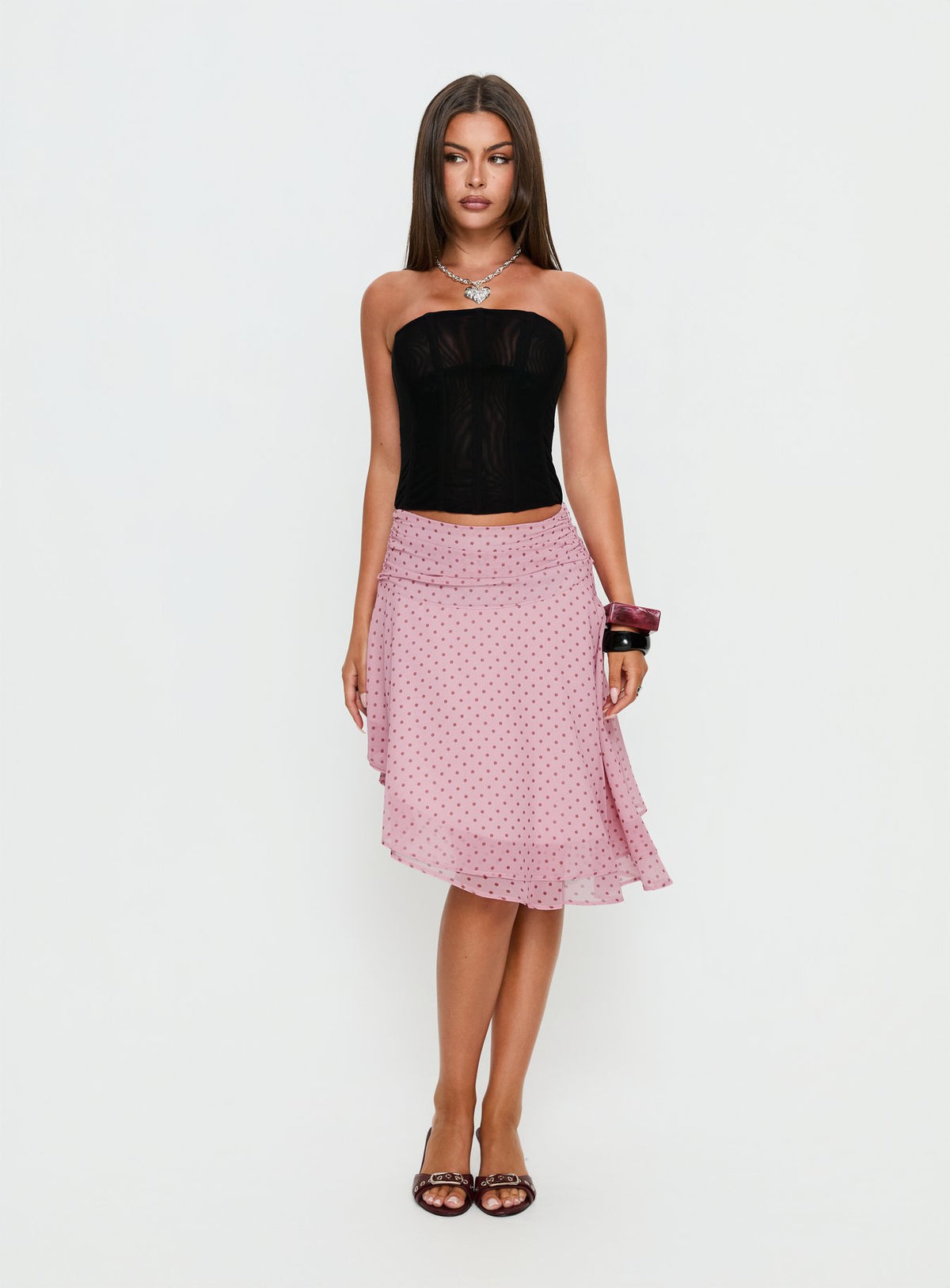   front view of model wearing Princess Polly Evanescence Asymmetrical Midi Skirt Pink Polka Dot Midi Skirts Skirts 