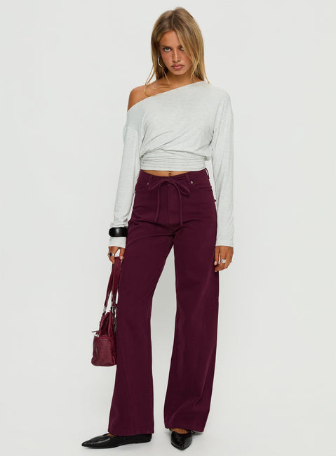 side view of model wearing Princess Polly Bruiser Tie Waist Mid Rise Wide Leg Jeans Currant High Rise Jeans 