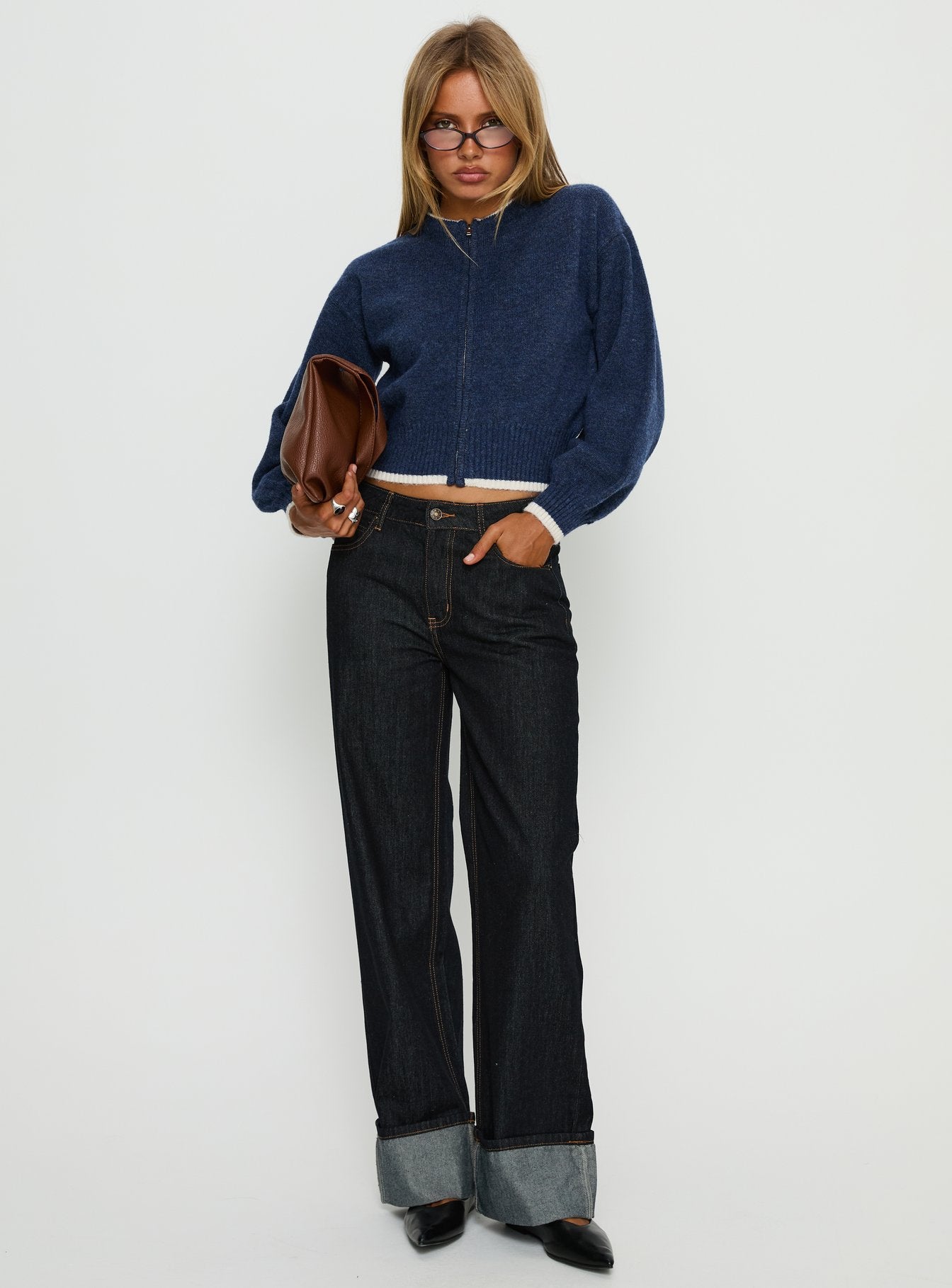 side view of model wearing Princess Polly Amandi Zip Through Knit Jumper Navy / Cream Cropped Jumpers 