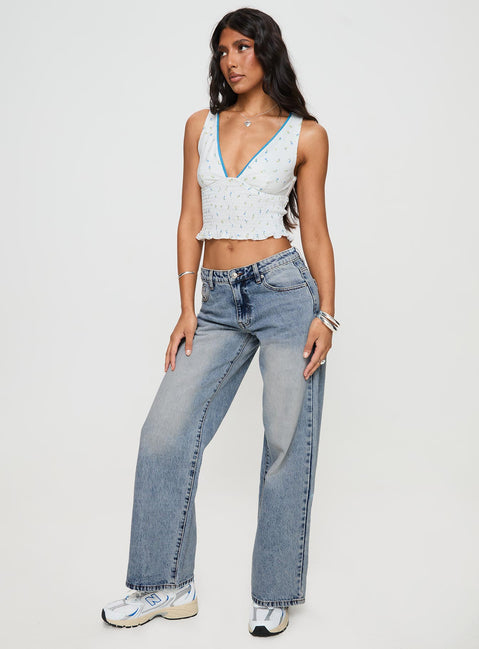 front view of model wearing Princess Polly Ronine Low Rise Wide Leg Jean Light Wash Low Rise Jeans 