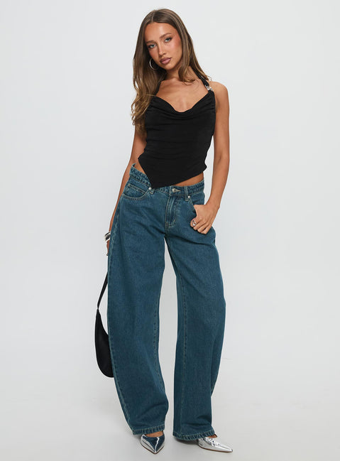 side view of model wearing Princess Polly Juda Mid Rise Barrel Leg Jeans Mid Blue Wash High Waisted Jeans 