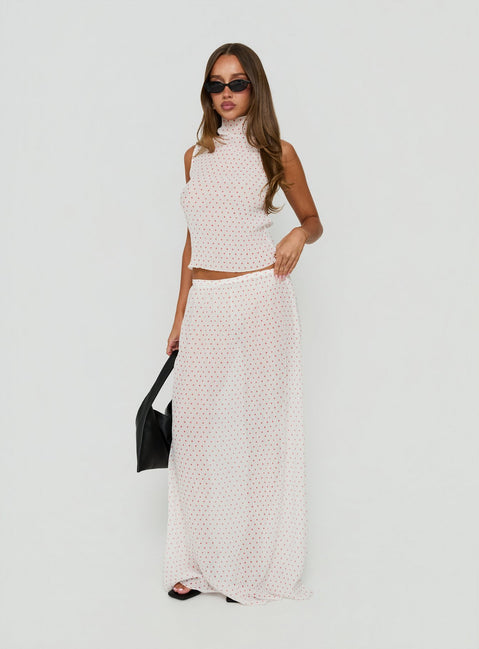 Showcasing the Ford Maxi Skirt White Red Polka Dot in womens-skirts with maxi length front view of model wearing Princess Polly