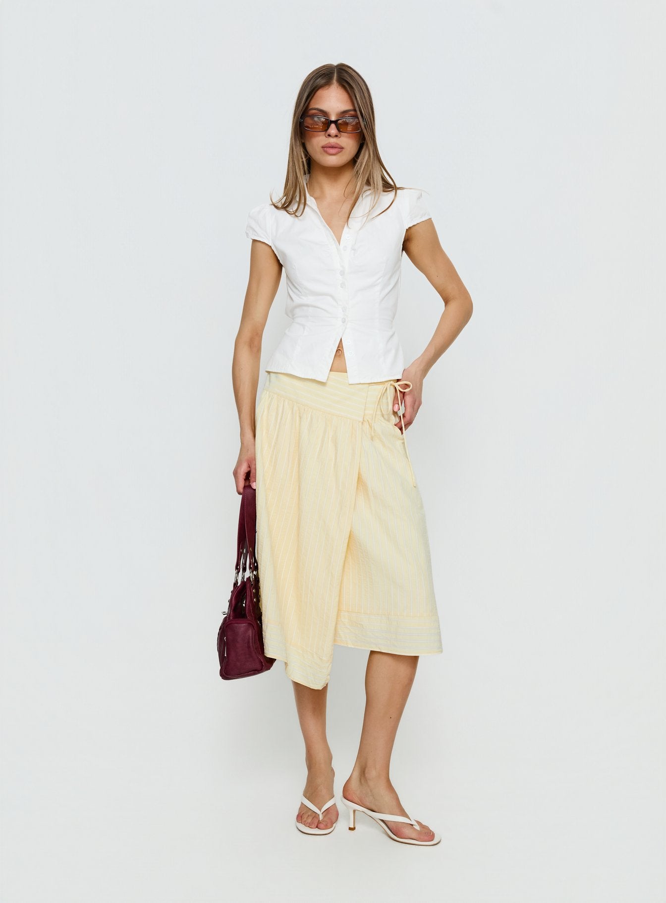   front view of model wearing Princess Polly Sunney Wrap Midi Skirt Yellow Midi Skirts 